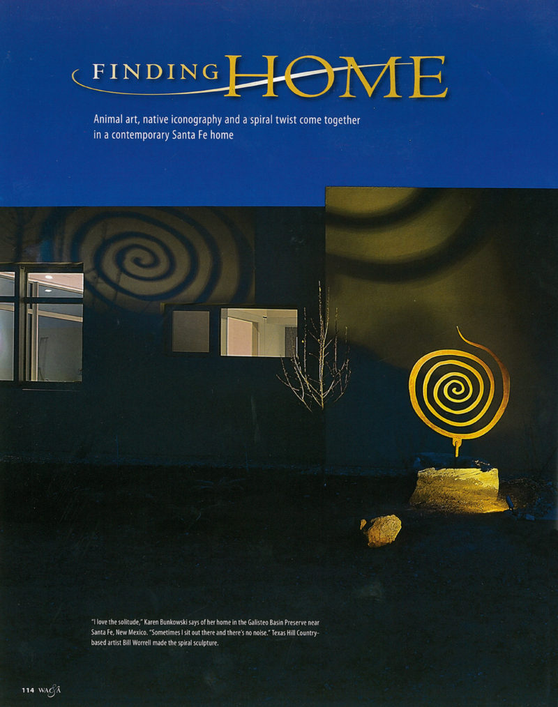 Magazine page featuring the article 'Finding Home,' showcasing a contemporary Santa Fe home with a spiral sculpture and modern design.